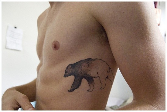 Idea of bear tattoo on ribs for men