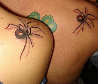 Identical spider tattoos on friends