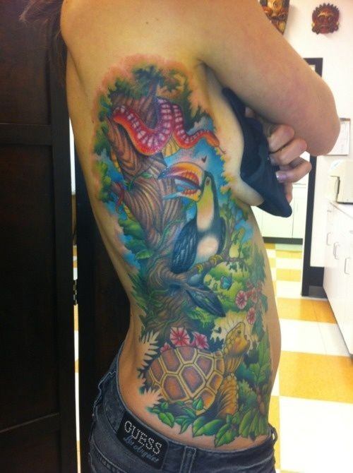 Illustrative colored side tattoo of various wild life animals and birds