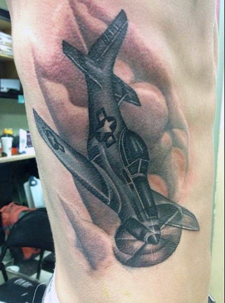 Illustrative large colored side tattoo of fighter plane