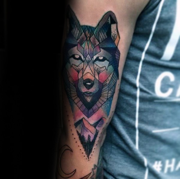 Illustrative style arm tattoo of Wolf head