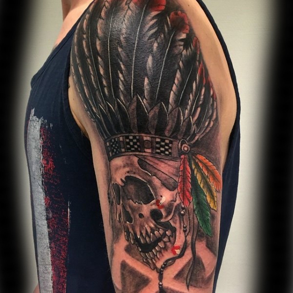 Illustrative style beautiful colored shoulder tattoo of Indian skull with big feather helmet
