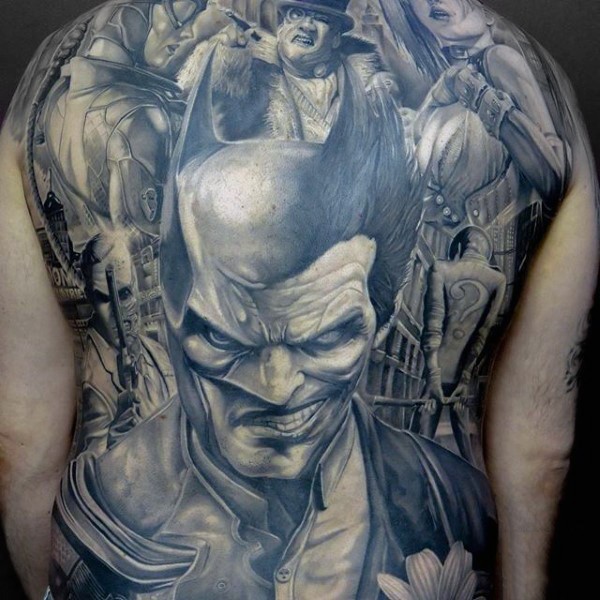 Illustrative style black ink back tattoo of half Batman half Joker