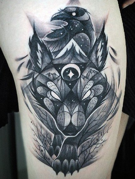 Illustrative style black ink wolf head with crow tattoo on shoulder