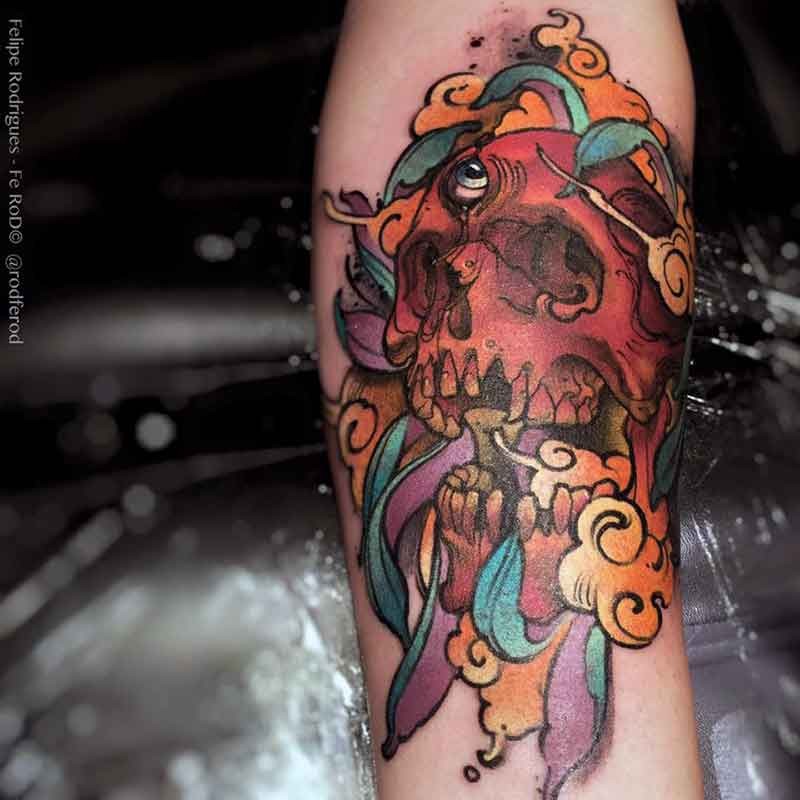 Illustrative style colored arm tattoo of mystical skull with feather