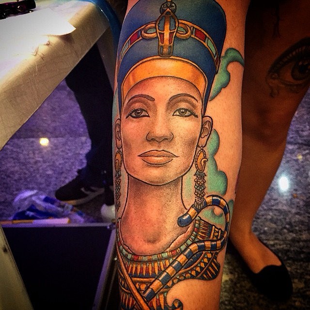 Illustrative style colored arm tattoo of ancient Egypt queen
