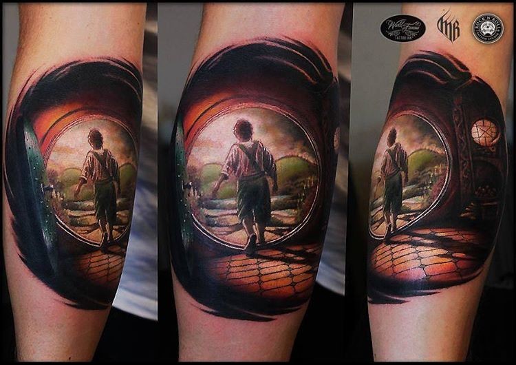 Illustrative style colored arm tattoo of little Hobbit