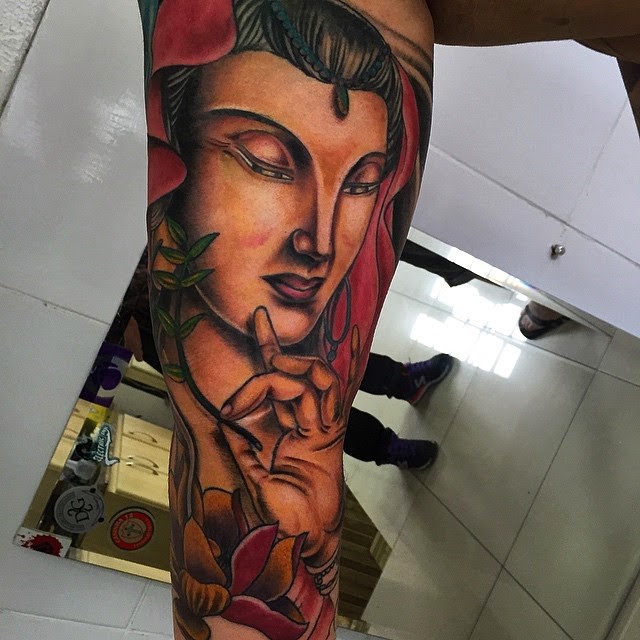 Illustrative style colored arm tattoo of Buddha statue with flowers