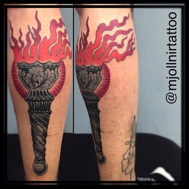 Illustrative style colored arm tattoo of ancient torch