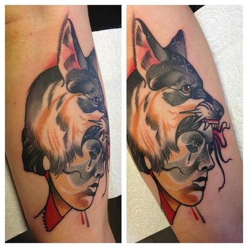 Illustrative style colored arm tattoo of woman head with wolf helmet