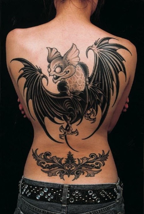 Illustrative style colored back tattoo of big funny bat