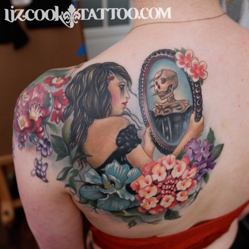 Illustrative style colored back tattoo of woman with mirror and flowers