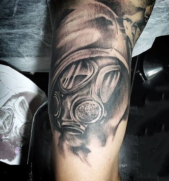 Illustrative style colored biceps tattoo of man in gas mask