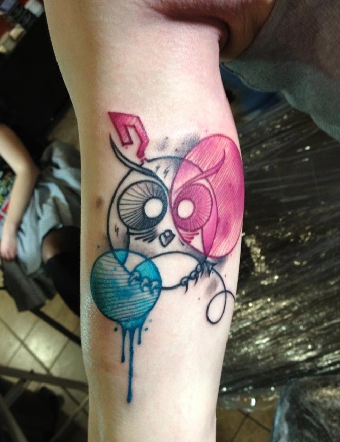 Illustrative style colored biceps tattoo of funny owl with circles
