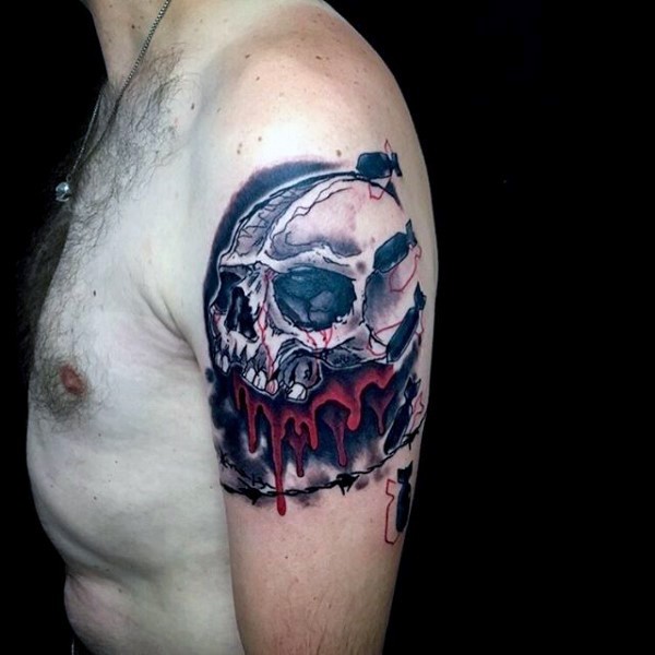 Illustrative style colored bloody skull tattoo on shoulder