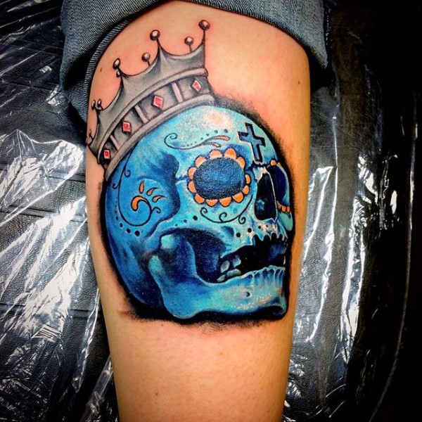 Illustrative style colored blue skull with small crown