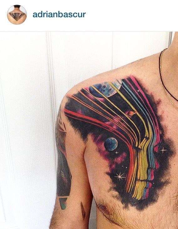 Illustrative style colored chest tattoo of woman face in space