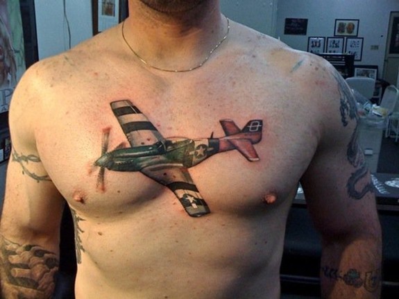 Illustrative style colored chest tattoo of little plane