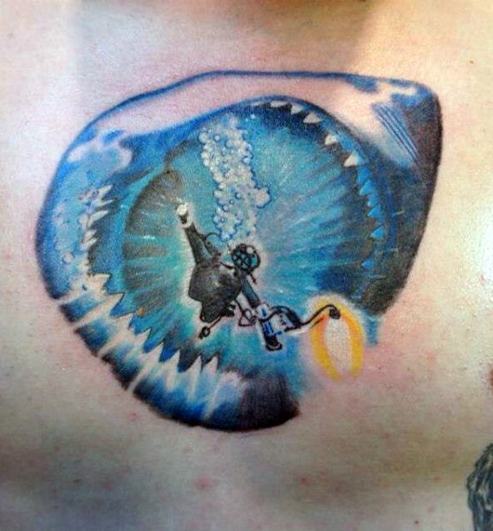 Illustrative style colored chest tattoo of diver and shark