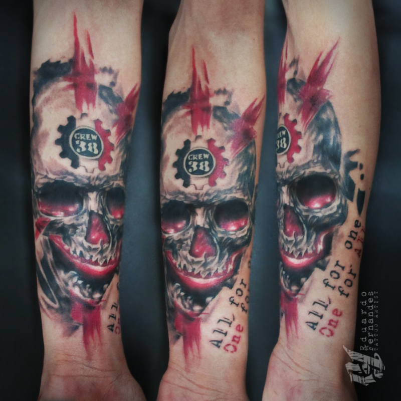 Illustrative style colored forearm tattoo of human skull with lettering and number