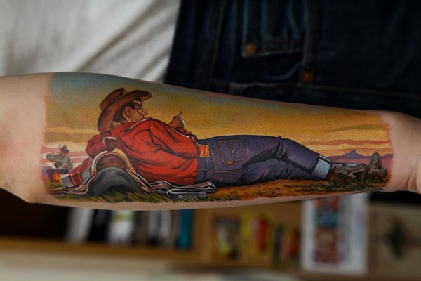 Illustrative style colored forearm tattoo of cowboy