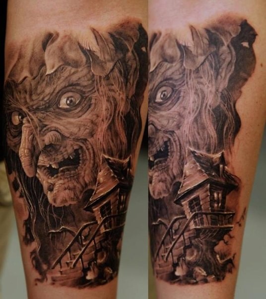 Illustrative style colored forearm tattoo of creepy witch with tree house