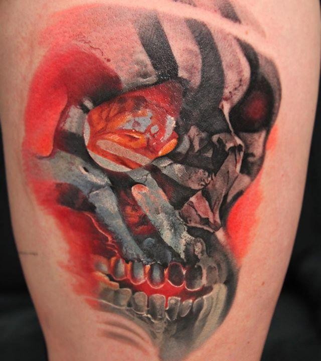 Illustrative style colored human skull tattoo