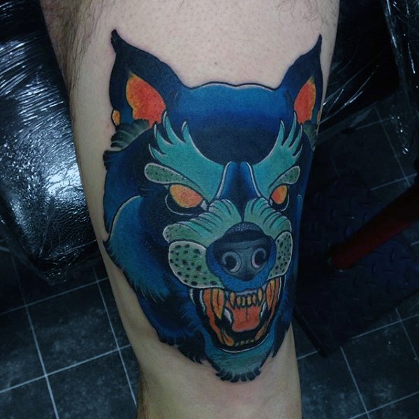 Illustrative style colored knee tattoo of demonic wolf