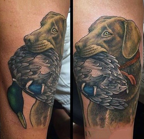 Illustrative style colored leg tattoo of hunters dog and duck