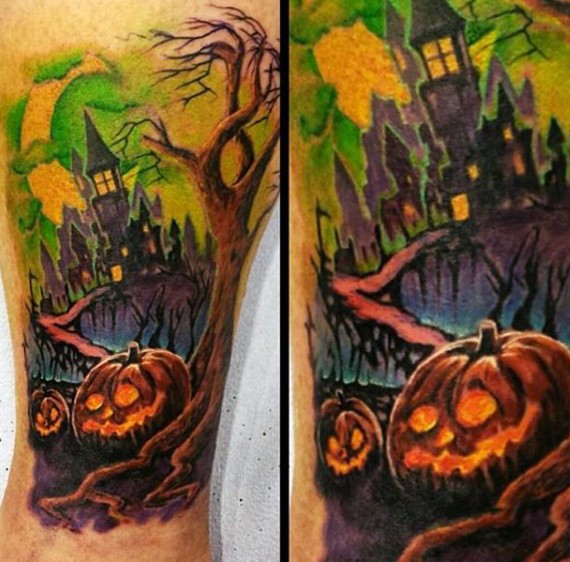 Illustrative style colored leg tattoo of big old creepy house and pumpkins