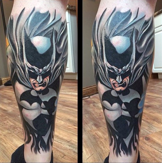 Illustrative style colored leg tattoo of Batman