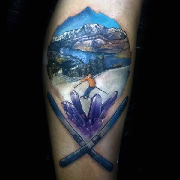 Illustrative style colored leg tattoo of skiing man with winter forest