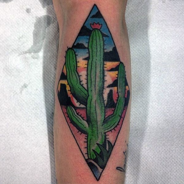 Illustrative style colored leg tattoo of desert picture with cactus