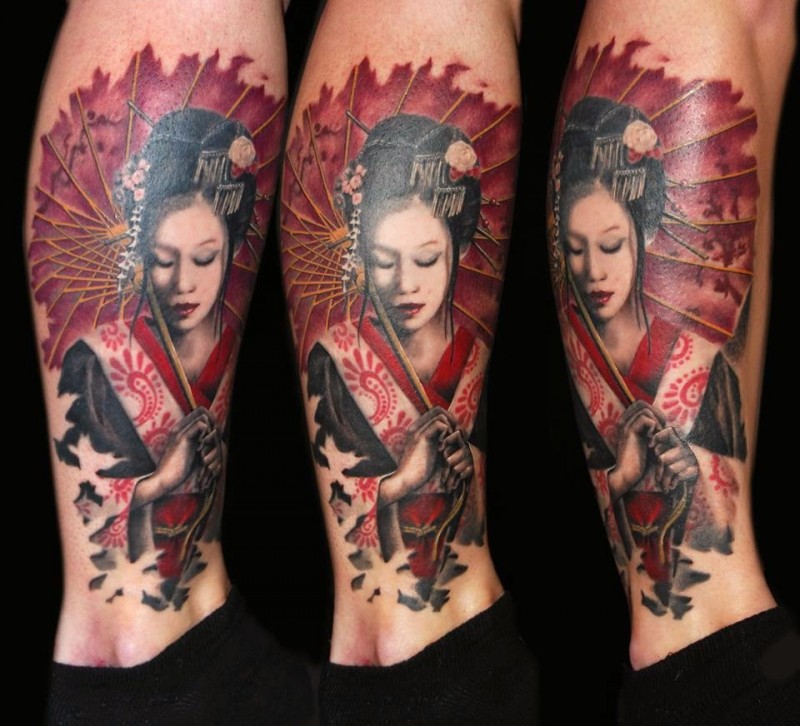 Illustrative style colored leg tattoo of geisha with leaves