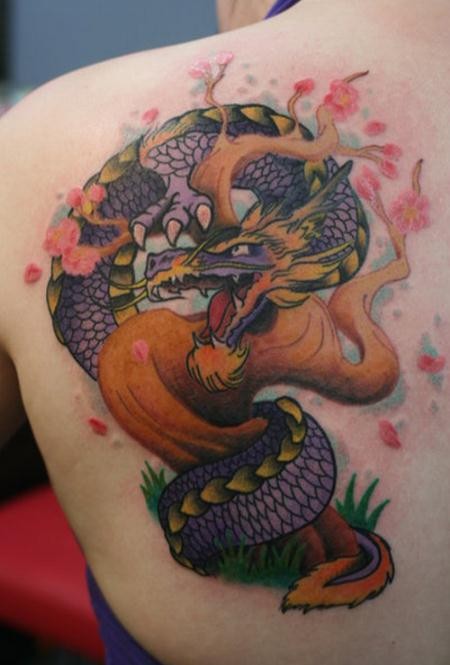 Illustrative style colored scapular tattoo of fantasy dragon with blooming tree