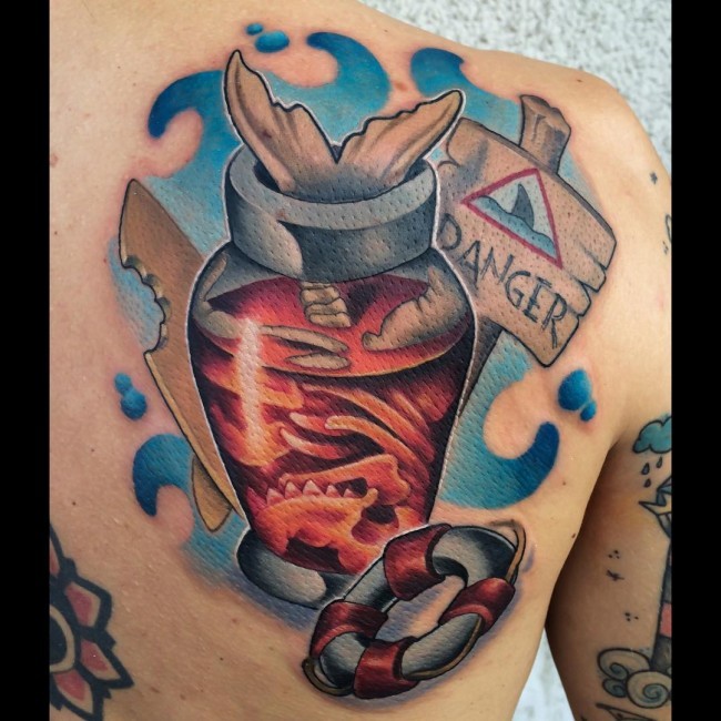 Illustrative style colored scapular tattoo of big pot with sign