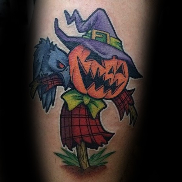 Illustrative style colored scarecrow tattoo on arm