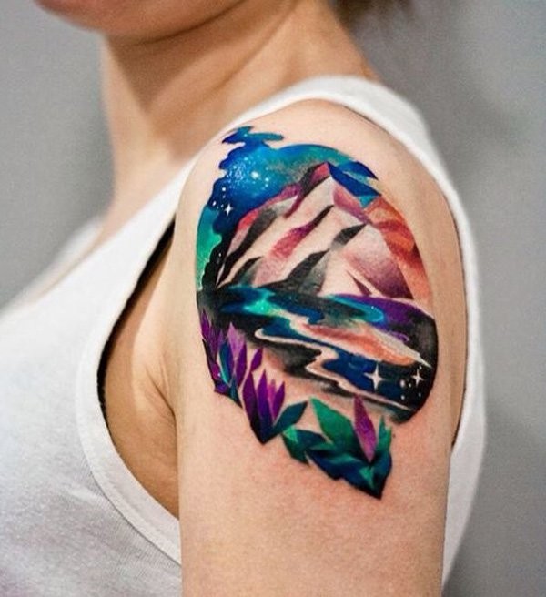 Illustrative style colored shoulder tattoo of mountains with flowers