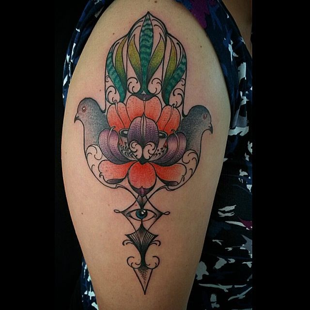 Illustrative style colored shoulder tattoo of Hamsa symbol stylized with flowers