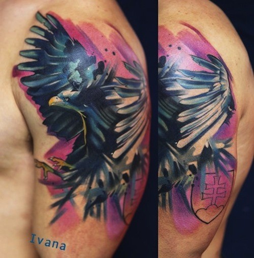 Illustrative style colored shoulder tattoo of flying crow