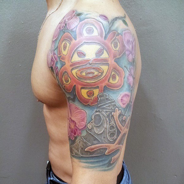 Illustrative style colored shoulder tattoo of ancient stone statues with lettering