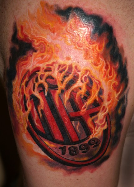 Illustrative style colored shoulder tattoo of burning AC Milan club emblem