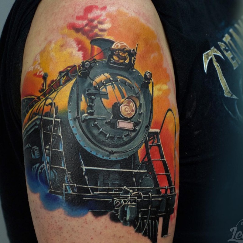 Illustrative style colored shoulder tattoo of steamy train