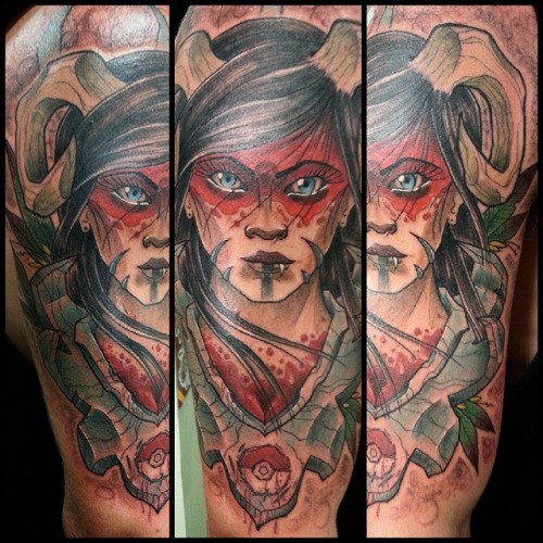 Illustrative style colored shoulder tattoo of devil woman