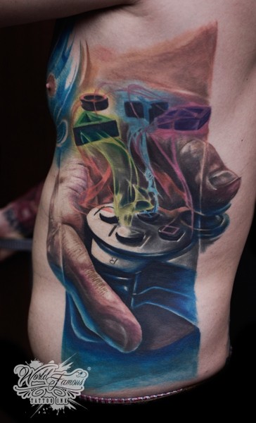 Illustrative style colored side tattoo of Play Station game pad