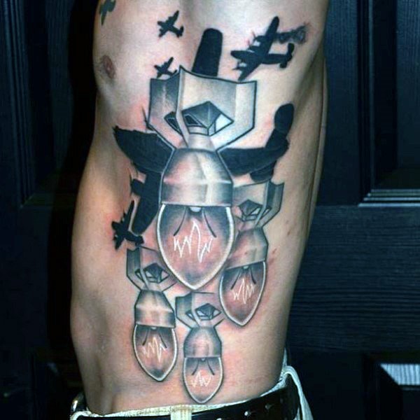 Illustrative style colored side tattoo of bomb shaped bulbs with WW2 planes