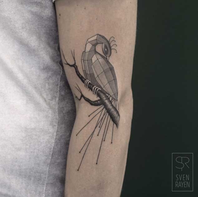 Illustrative style colored tattoo of bird with tree branch