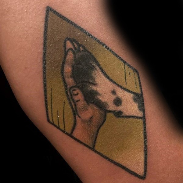 Illustrative style colored tattoo of human and dog friendship symbol