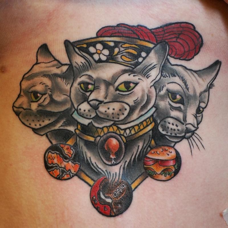 Illustrative style colored tattoo of nice cats with emblems