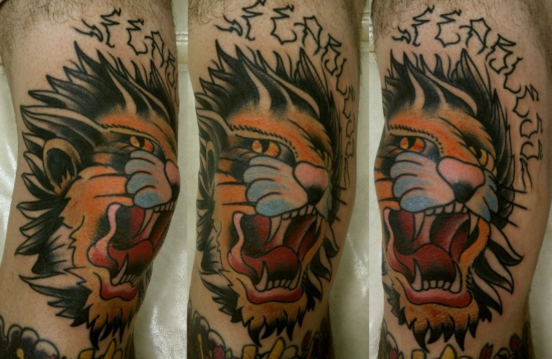 Illustrative style colored tattoo of roaring tiger with lettering
